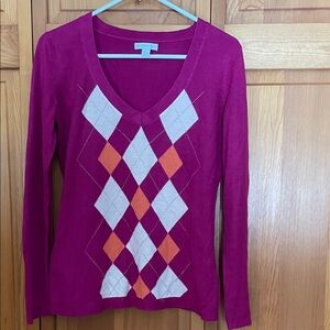 Women’s argyle sweaters.